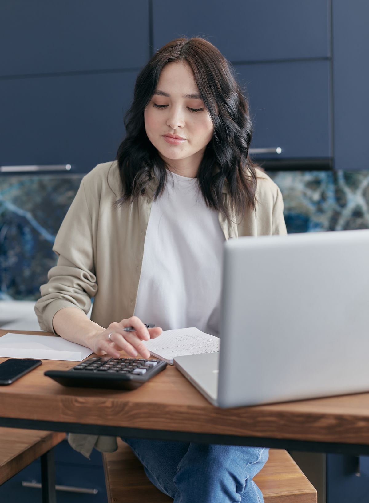 Woman reviewing her household budget